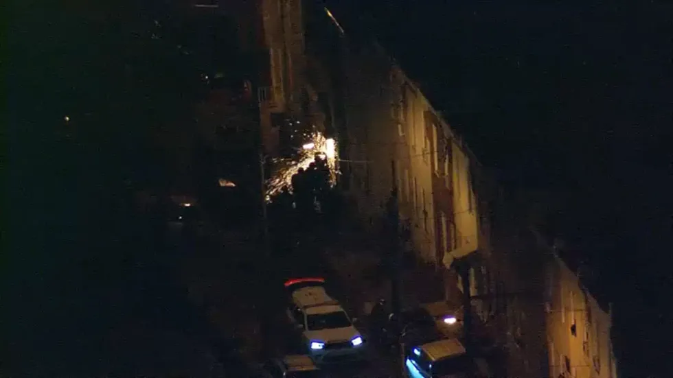 SWAT team breaks into steel-doored garage looking for suspects