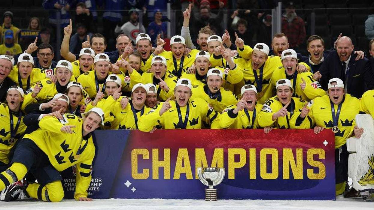 Sweden players celebrate after winning an IIHF World Junior Hockey Championship gold medal game against Czechia, Monday, Jan. 5, 2026, in St. Paul, Minn.