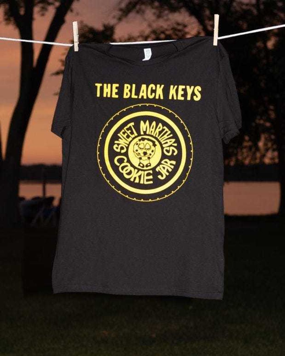 Sweet Martha’s Cookie Jar has partnered the Black Keys to sell a limited-edition T-shirt.