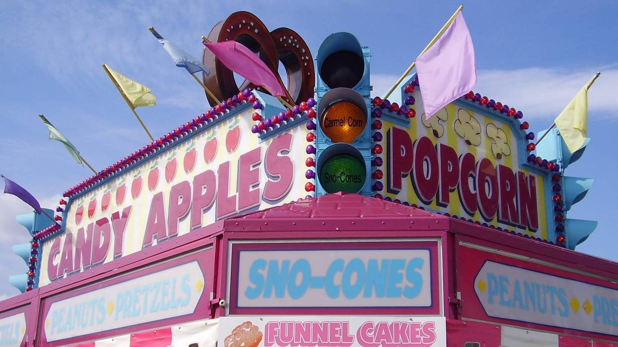 Sweets and nuts are available at this carnival food booth