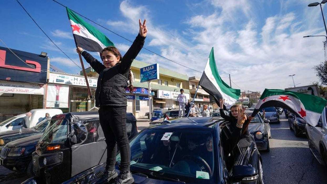 Syrians celebrate the fall of Bashar Assad's government
