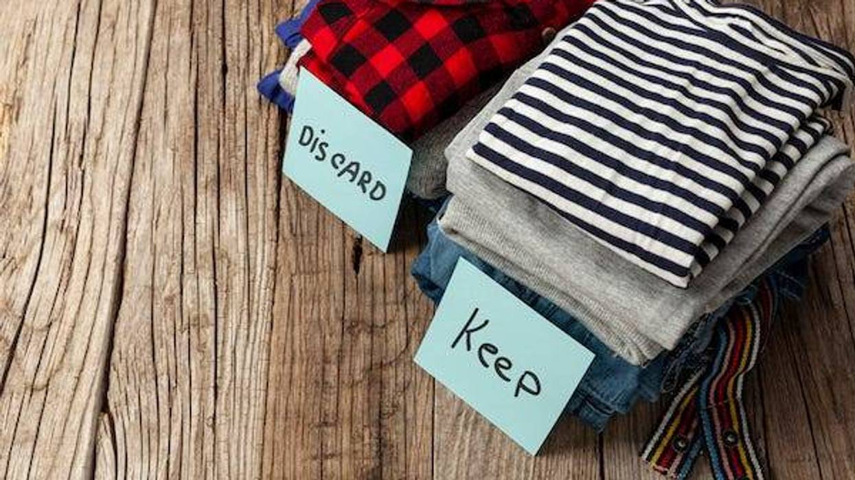 tack of old clothes to discard or keep