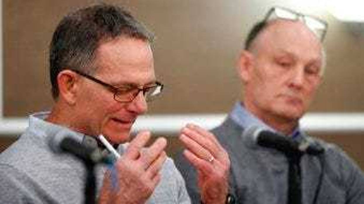 Tad Deluca, a University of Michigan wrestler from the 1970s, speaks during a news a news conference. He says he was kicked off the team and lost his financial aid after complaining that he had been abused by a sports doctor. (AP Photo/Carlos Osorio)