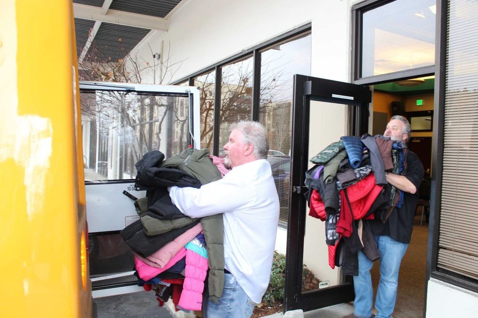 Taking the coats to the bus!