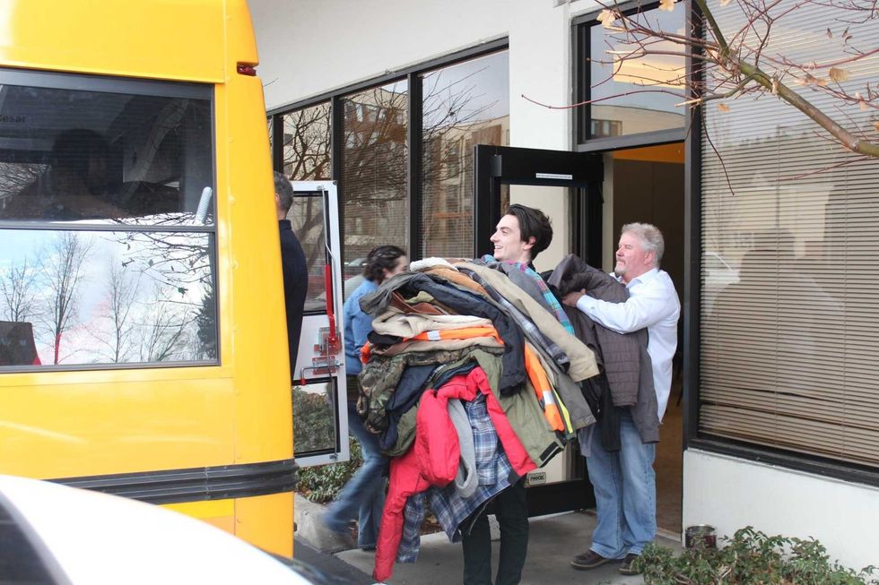 Taking the coats to the bus!