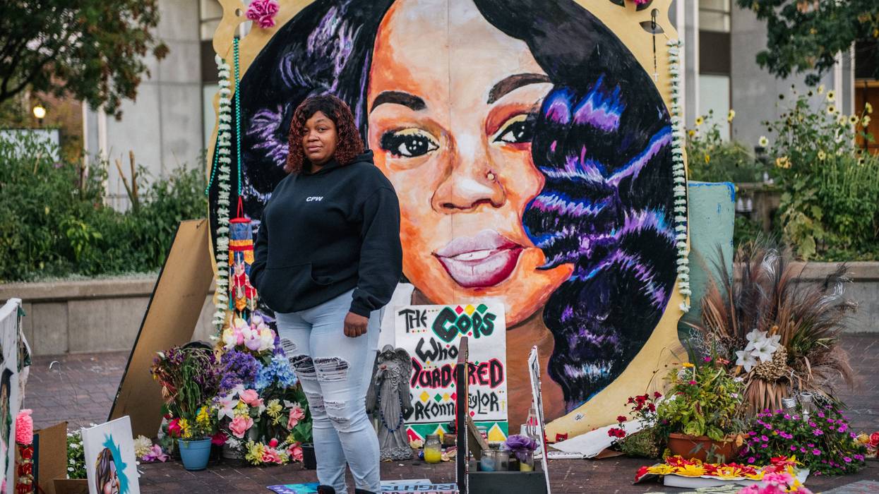 Tamika Palmer, mother of Breonna Taylor, poses for a portrait in front of a mural of her daughter at Jefferson Square park on September 21, 2020 in Louisville, Kentucky.