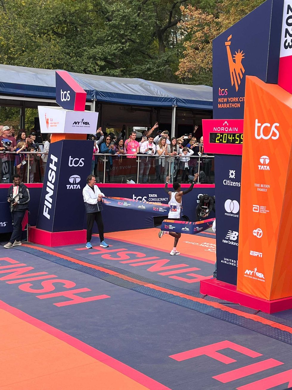 Tamirat Tola wins the men
