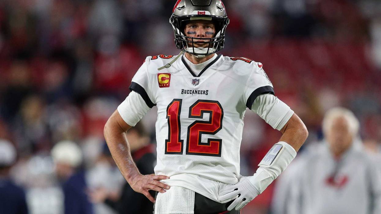 Tampa Bay Buccaneers quarterback Tom Brady (12) looks on before a wild card game against the Dallas Cowboys at Raymond James Stadium.