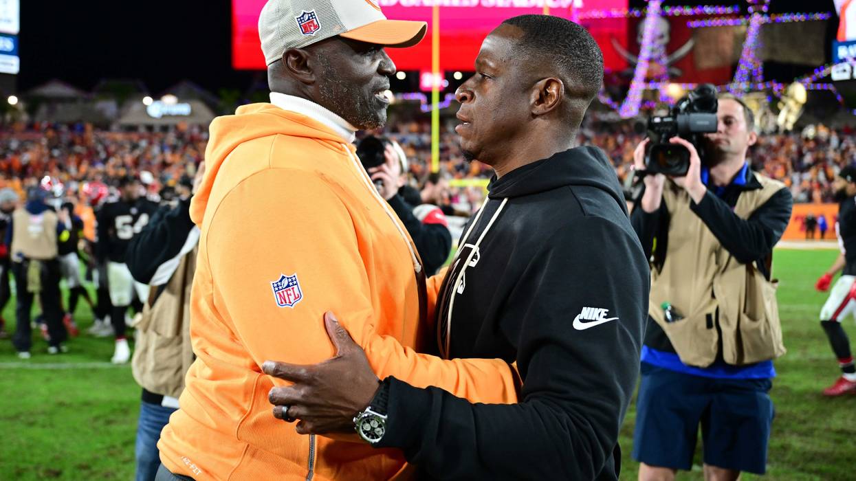 TAMPA, FLORIDA - DECEMBER 11: Head coach Todd Bowles of the Tampa Bay Buccaneers and head coach Raheem Morris of the Atlanta Falcons meet after the Falcons beat the Buccaneers 29-28 at Raymond James Stadium on December 11, 2025 in Tampa, Florida.