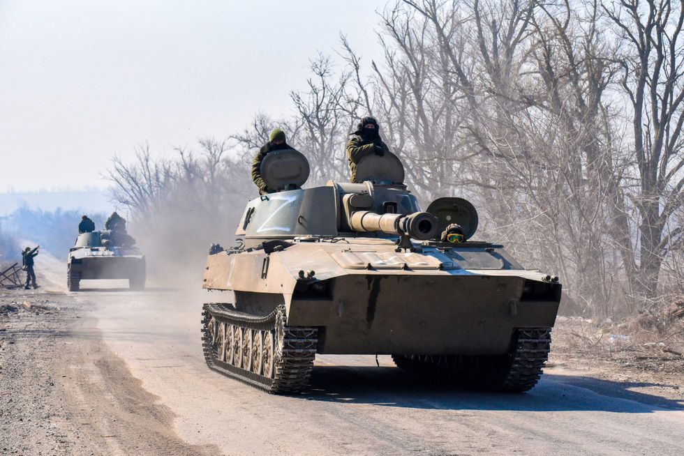 Tanks on a road between the villages of Sopino and Bezymennyoye in the Donetsk region of Ukraine on March 21, 2022