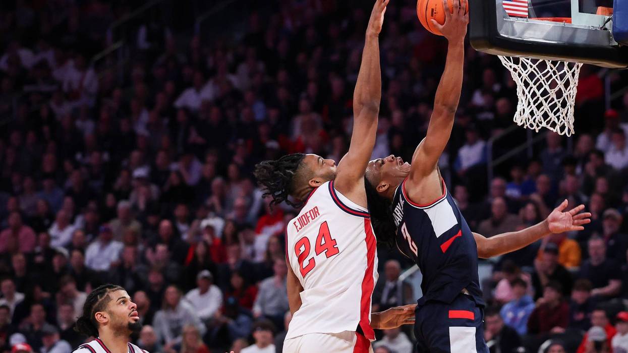 Tarris Reed, Jr. of UConn shoots the ball against Zuby Ejiofor of the St. John's Red Storm during the 2026 Big East Championship game at Madison Square Garden, 3/14/26