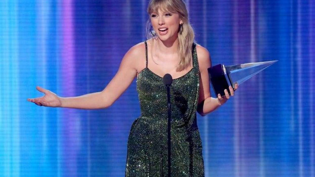 Taylor Swift accepts the Favorite Album - Pop/Rock award for 'Lover' performs onstage during the 2019 American Music Awards
