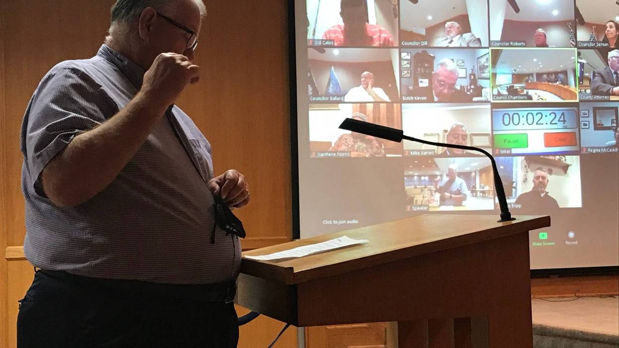 Taylors Fire and Sewer District commissioner Jeff Hannah speaks to county council