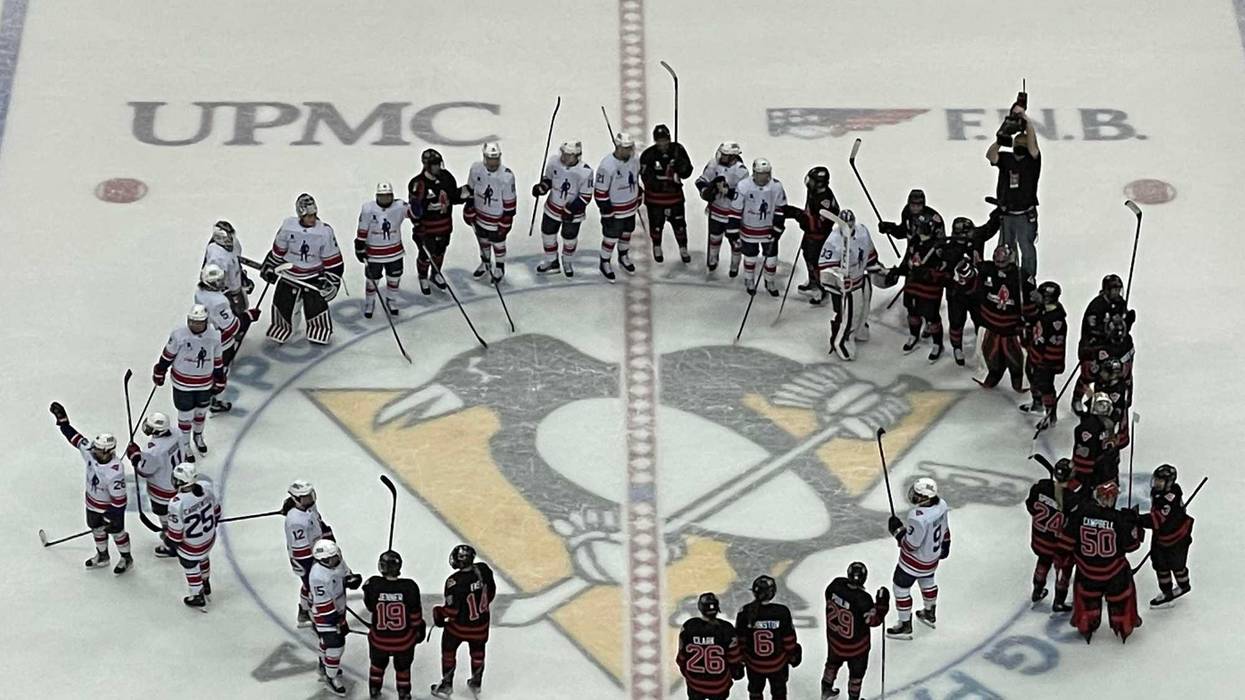 Team USA and Team Canada on ice