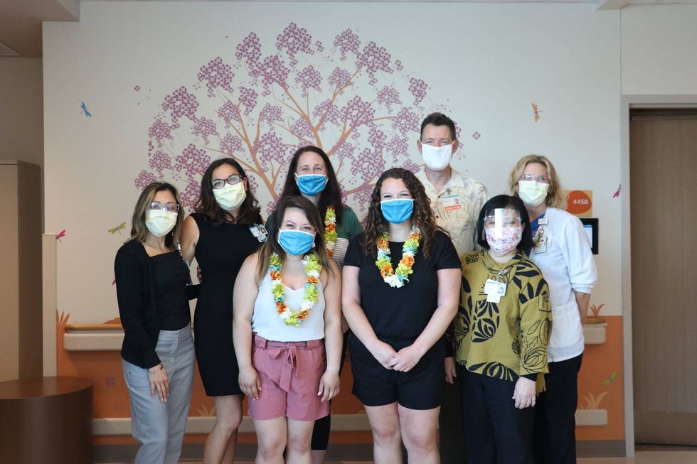 Team who delivered baby on airplane