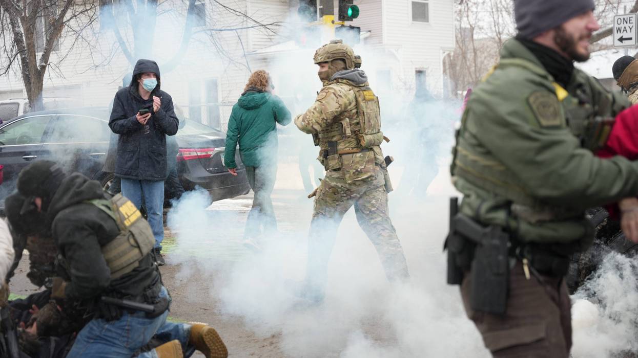 Tear gas is deployed as Federal agents make arrests on Wednesday, Jan. 21, 2026, in Minneapolis.