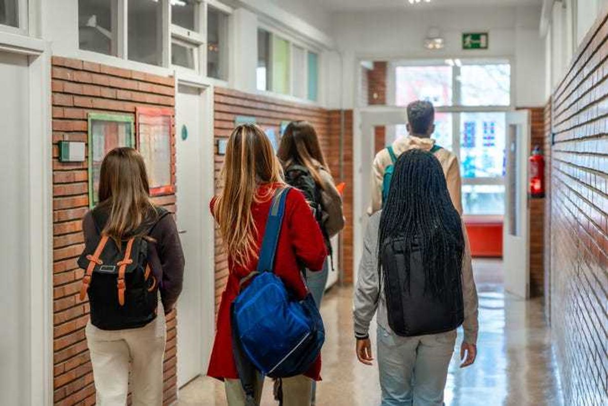 teens in hallway at school