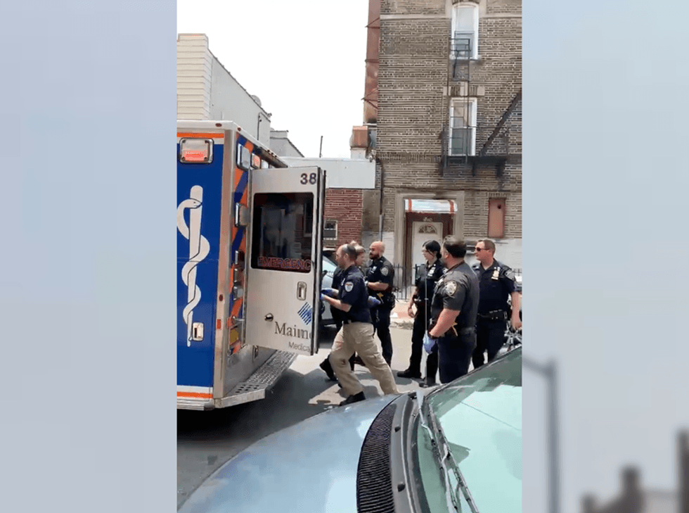 Teens were shot at as they stood outside a grocery store, police said.