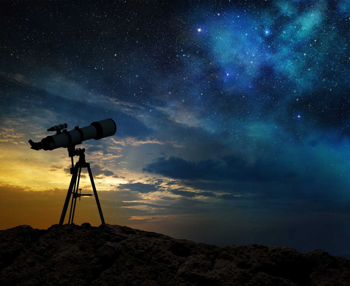Telescope night sky stock photo.