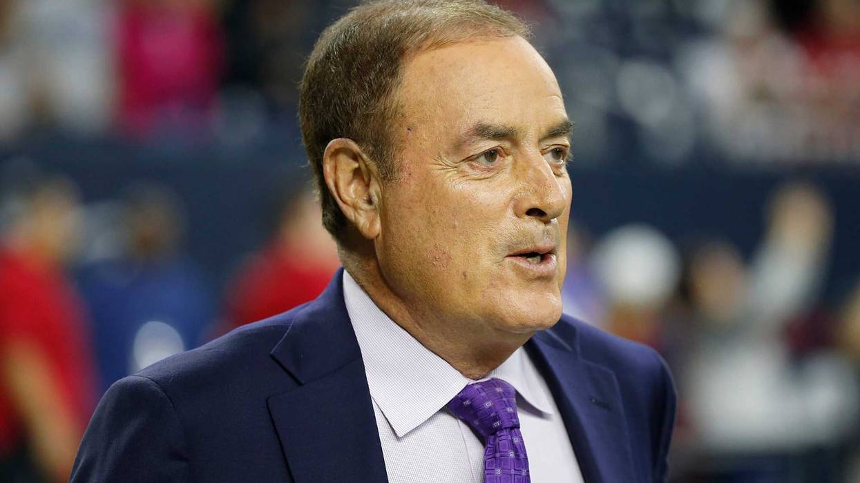 Television announcer Al Michaels watches the Houston Texans warm up before the Texans play the New England Patriots on Dec. 13, 2015, at NRG Stadium in Houston, Texas.