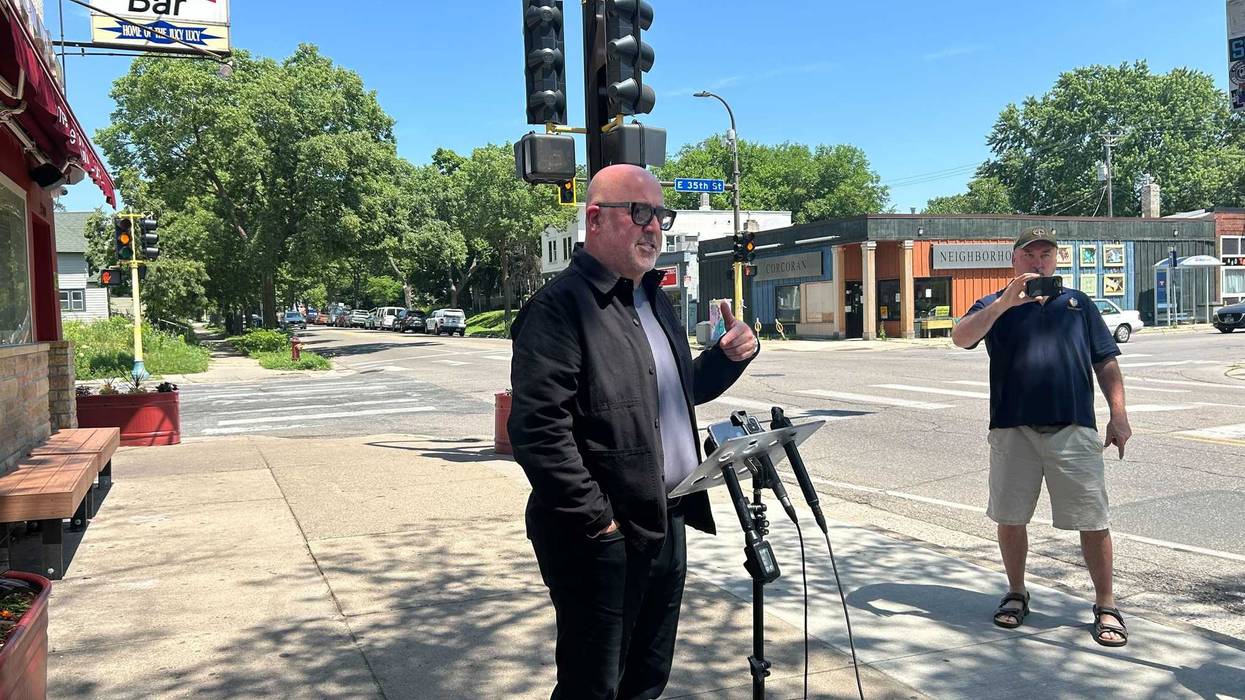 Television celebrity and chef Andrew Zimmern standing outside Minneapolis' famous Matt's Bar. Their "Jucy Lucy" will be a featured food item at this year's "Taste of Minnesota" in downtown Minneapolis July 5 and 6.