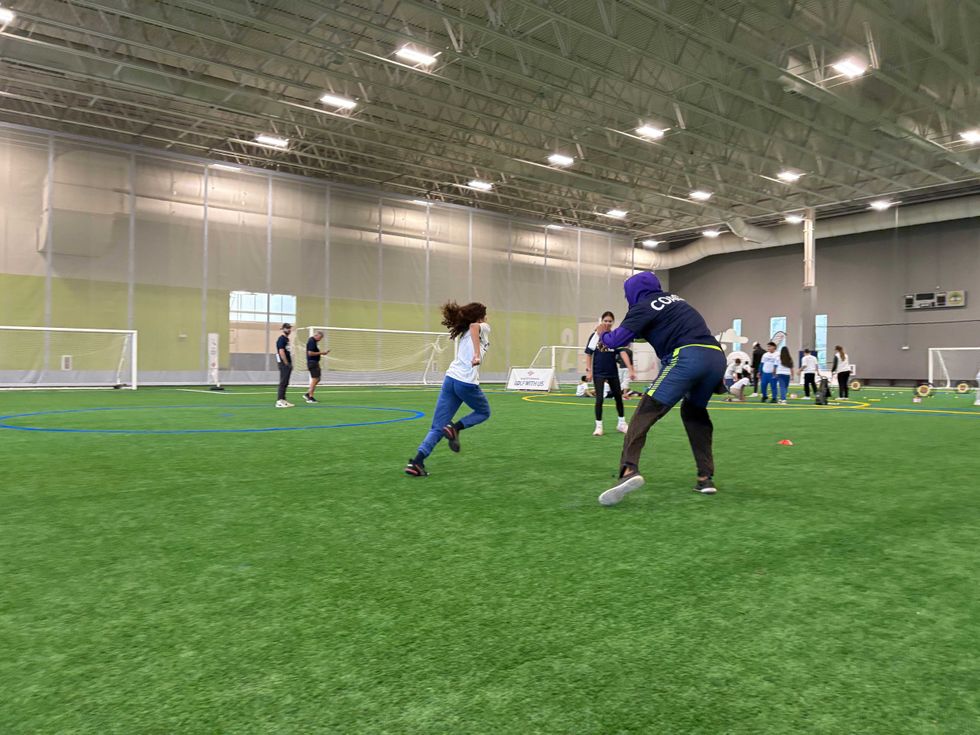 Ten-year-old Eliannah Allen shows off her running skills at Bank of America