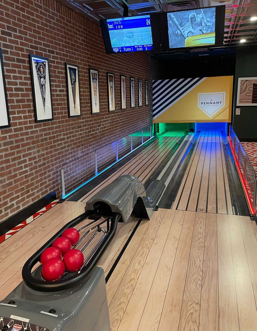 Tenants can take advantage of the bowling alley in The Pennant, a new apartment building in Hartford
