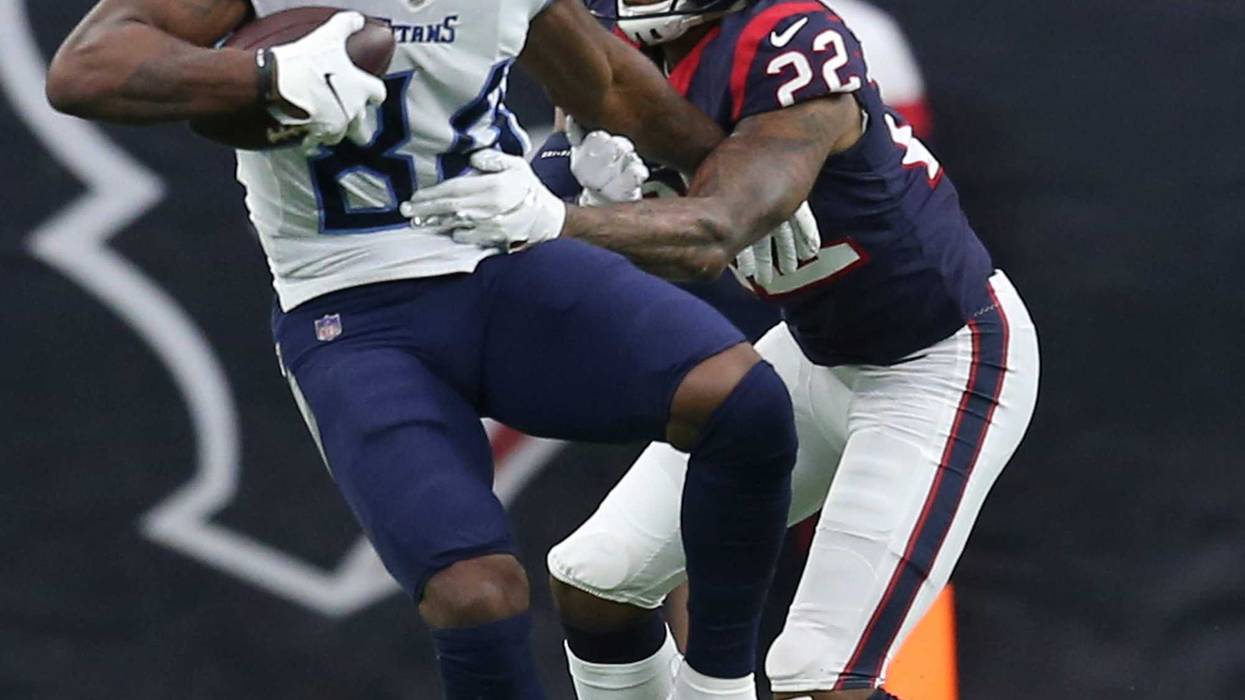 Tennessee Titans wide receiver Corey Davis (84) catches the ball against Houston Texans cornerback Gareon Conley (22) in the second quarter at NRG Stadium.