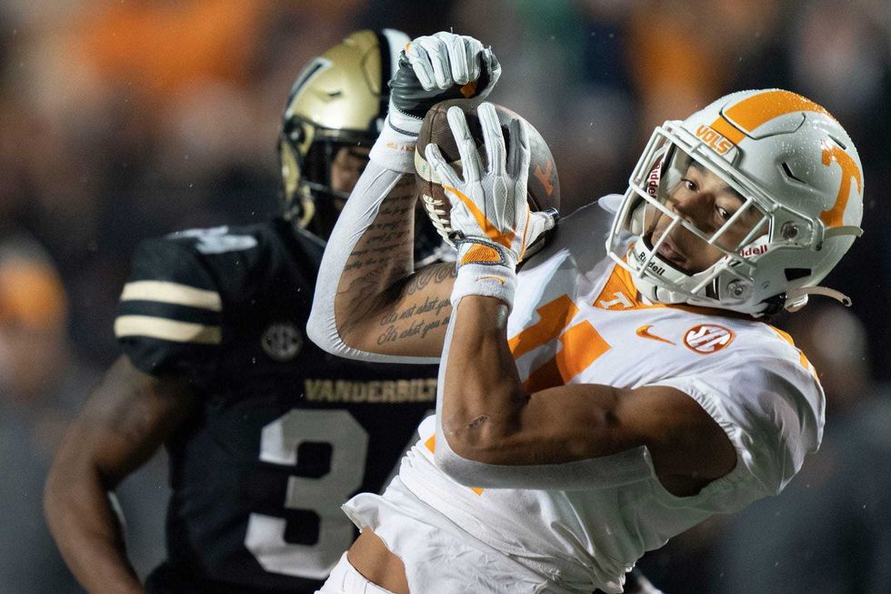 Tennessee wide receiver Jalin Hyatt (11) pulls in a first down catch Vanderbilt defensive back Ja