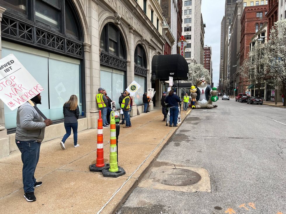 Terminal railroad workers picketing for paid sick day