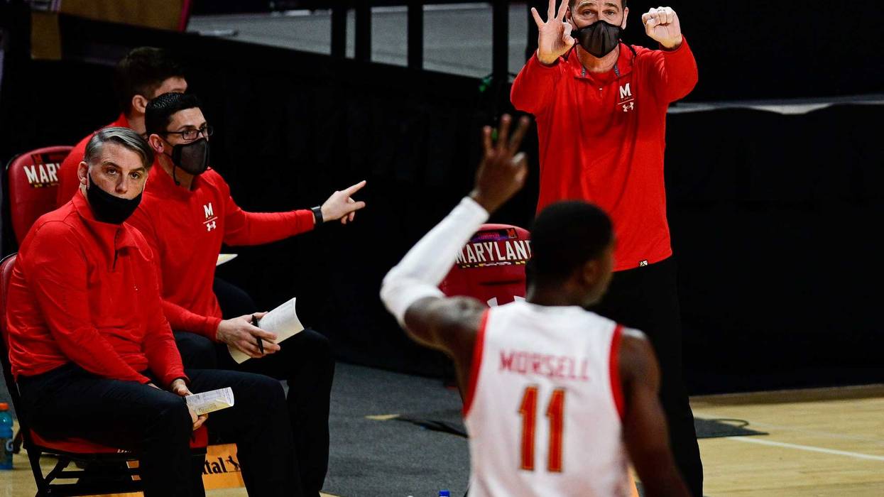 Terps Head Coach Mark Turgeon in the background with Senior Darryl Morsell in the foreground