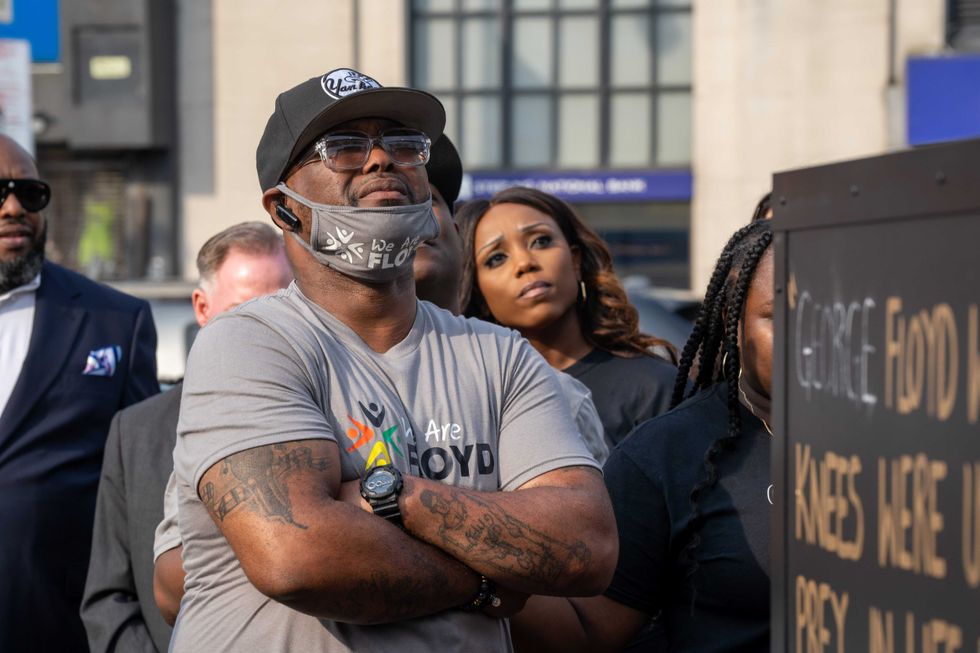 Terrance Floyd weeps during the unveiling of a statute dedicated to his brother George Floyd at Flatbush Junction on June 19, 2021, in the Brooklyn borough of New York City