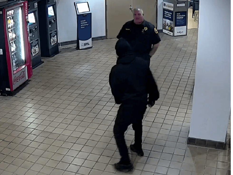Terry Key getting ready to fight deputy inside jail lobby