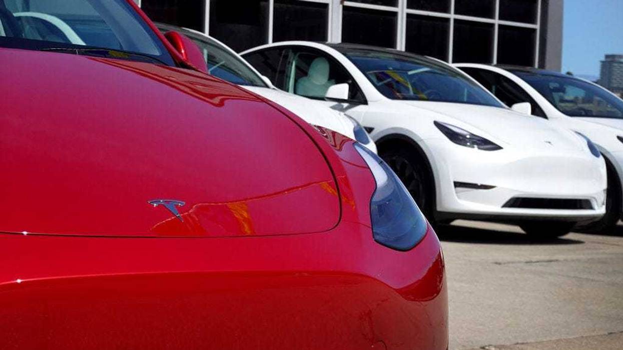Tesla cars sit in a dealership lot on March 28, 2022 in Chicago, Illinois. Shares of Tesla jumped more than 8 percent today after the electric car maker announced a second stock split in less than two years.