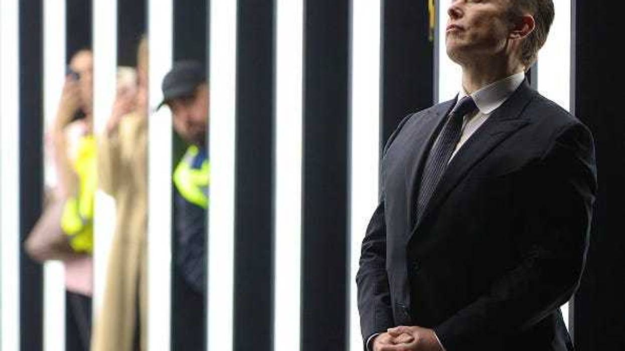 Tesla CEO Elon Musk contemplates during the official opening of the new Tesla electric car manufacturing plant on March 22, 2022 near Gruenheide, Germany.