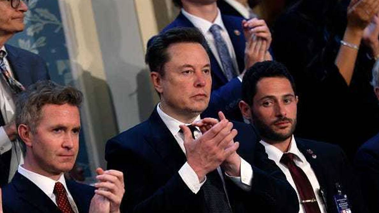Tesla CEO Elon Musk listens as Israeli Prime Minister Benjamin Netanyahu addresses a joint meeting of Congress in the chamber of the House of Representatives at the U.S. Capitol on July 24, 2024 in Washington, DC.
