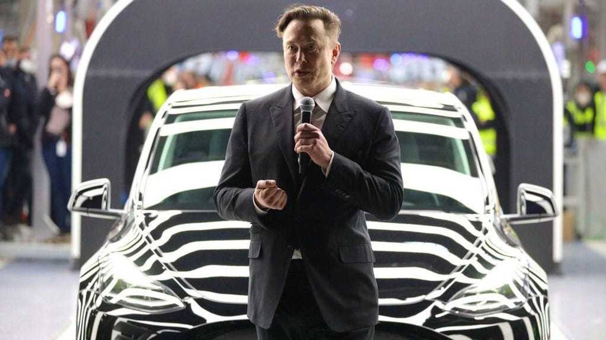 Tesla CEO Elon Musk speaks during the official opening of the new Tesla electric car manufacturing plant on March 22, 2022 near Gruenheide, Germany.