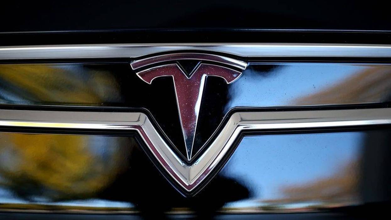 Tesla logo on front of car
