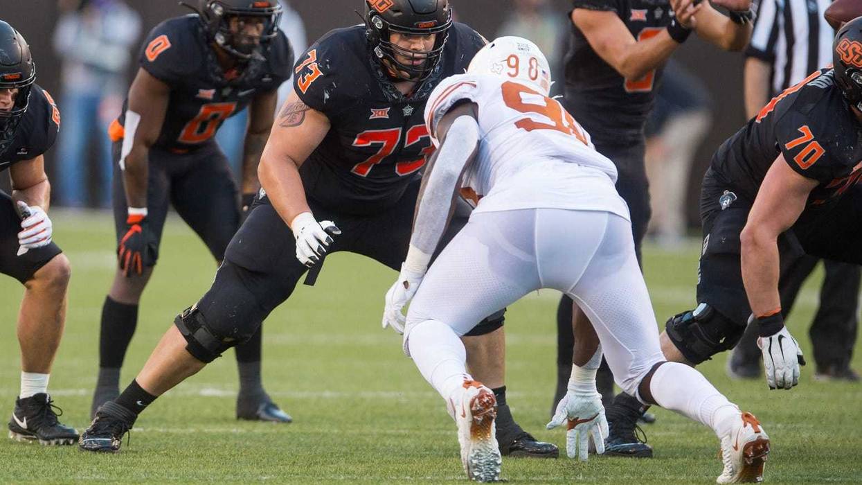 Teven Jenkins blocking for Oklahoma State