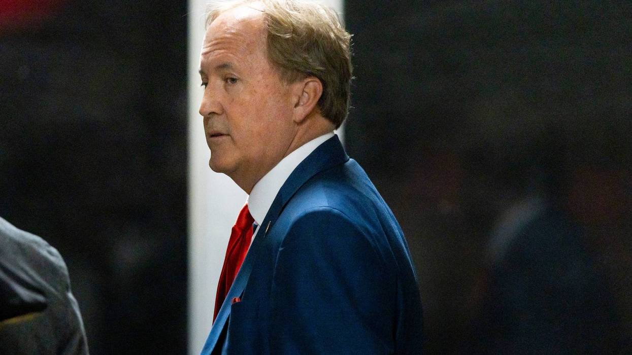 Texas Attorney General Ken Paxton arrives with former U.S. President Donald Trump to court during Trump's trial for allegedly covering up hush money payments at Manhattan Criminal Court on April 30, 2024 in New York City.