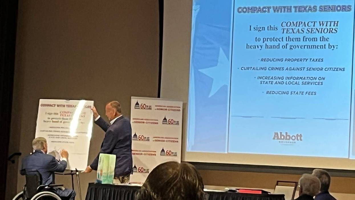 Texas Gov. Greg Abbott (R) signs a "compact with Texas seniors" in Fairview, Texas on Wednesday, Aug. 31, 2022.