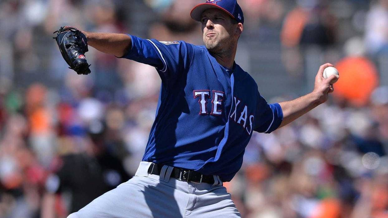 Texas Rangers starting pitcher Drew Smyly (33) works against a San Francisco Giants batter during the first inning at Scottsdale Stadium.