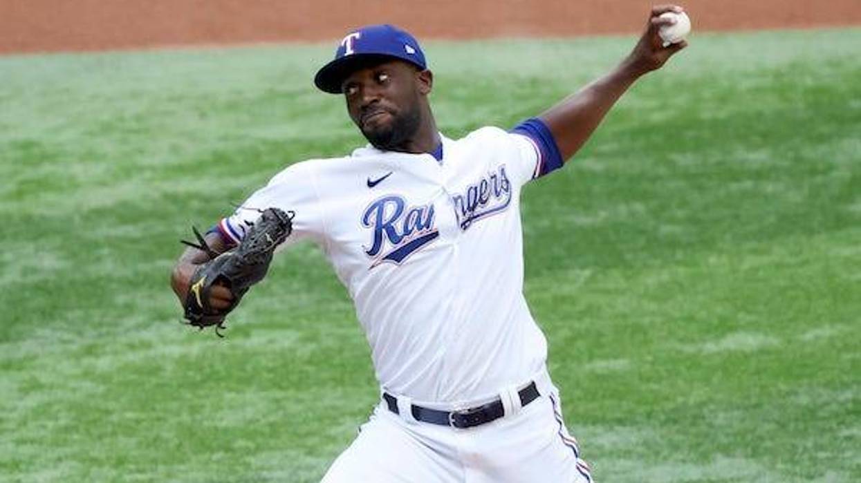 Texas Rangers starting pitcher Taylor Hearn throws during the first inning against the Colorado Rockies at Globe Life Field