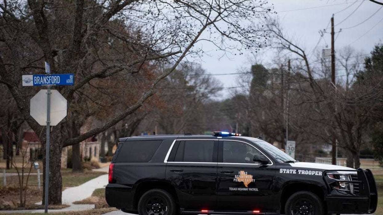 Texas State Trooper vehicle blocks off Shelton Drive on January 15, 2022 in Colleyville, Texas. Police responded to the situation after reports of a man with a gun was holding hostages at the synagogue. (Photo by Emil Lippe/Getty Images)