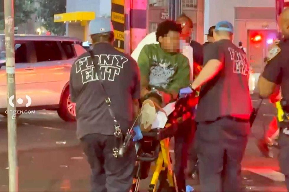 The 13-year-old victim was seen being taken away on a stretcher