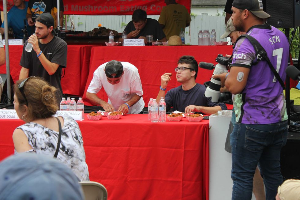 The 2022 Mushroom Festival eating competition. Photo by Sabrina Boyd-Surka.