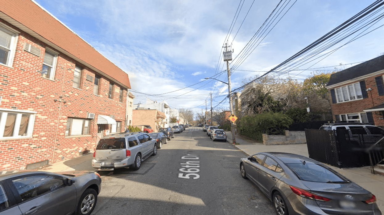The 23-year-old victim was found dead at her home on 56th Drive, between 59th Place and 60th Street, in Maspeth on Wednesday night