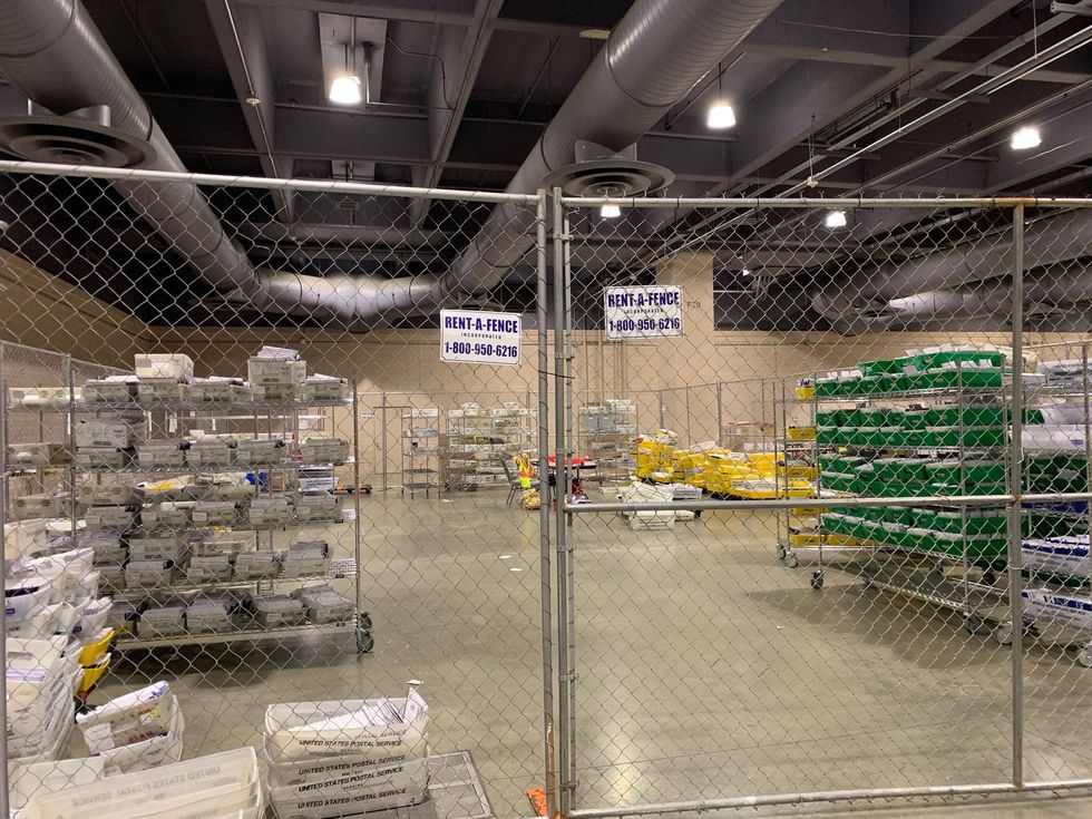 The 265,000 mail-in ballots that have been returned so far are stored being a fence until Election Day.