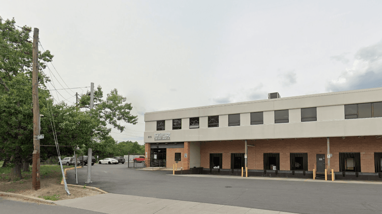 The 42-year-old worker was killed in a fall at Arrow Linen Supply Company in Garden City