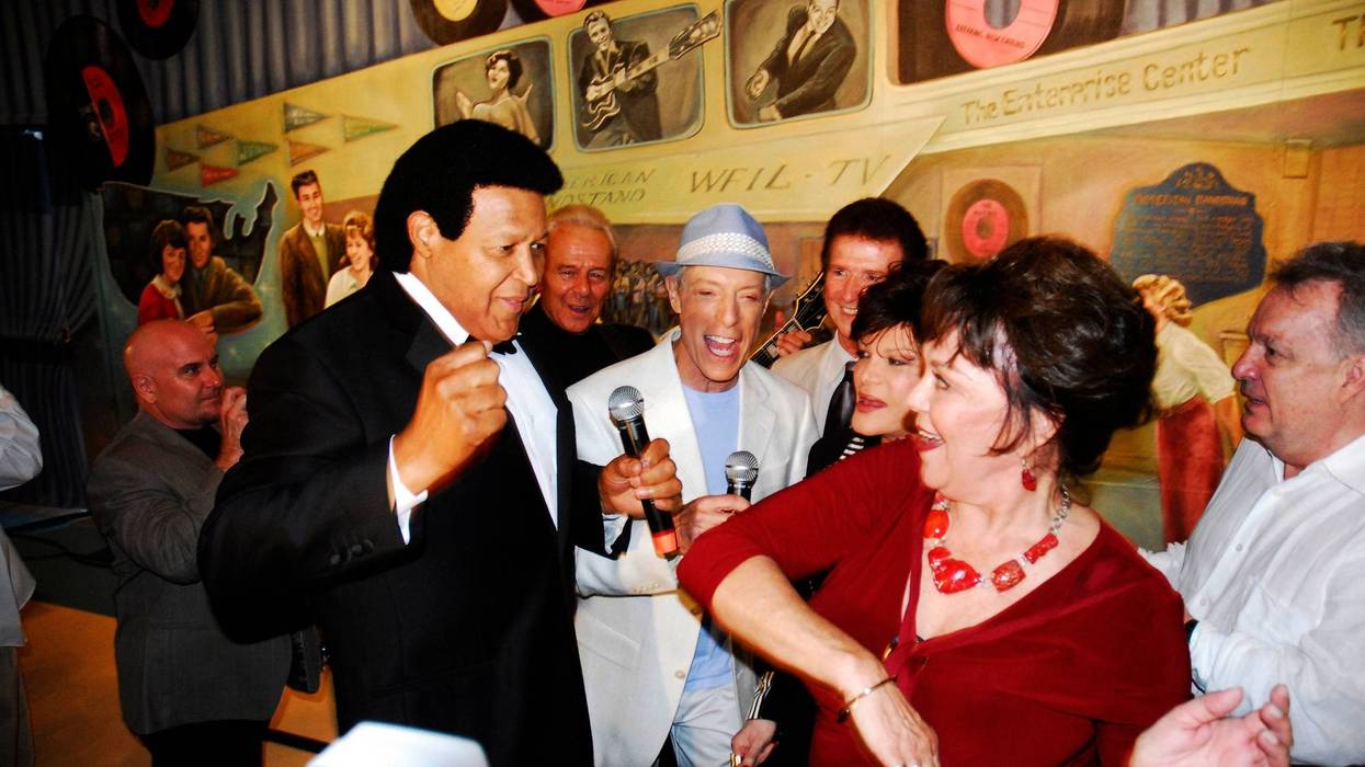 The 50th anniversary celebration of American Bandstand in Philadelphia in 2007. Chubby Checker does the twist with Kathleen "Bunny" Gibson, an early dancer on the show, as Jerry Blavat and Connie Francis (both center) watch.